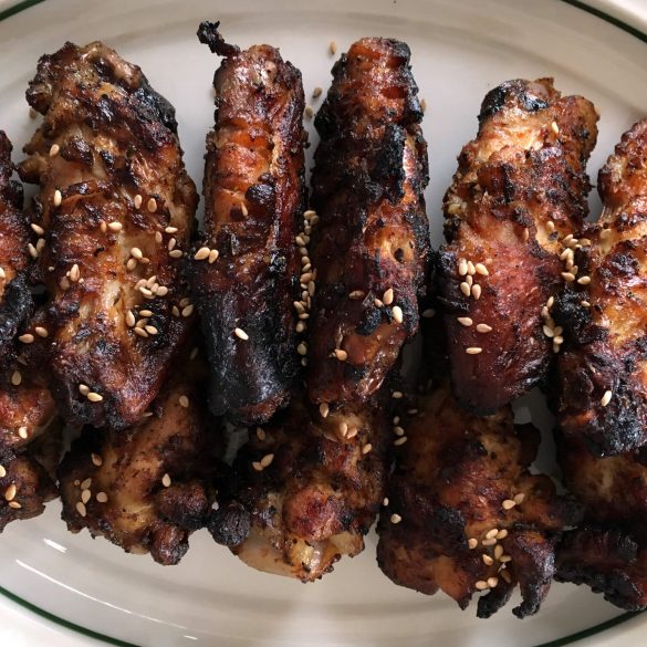 Grilled Asian-inspired chicken wings recipe ready to eat.