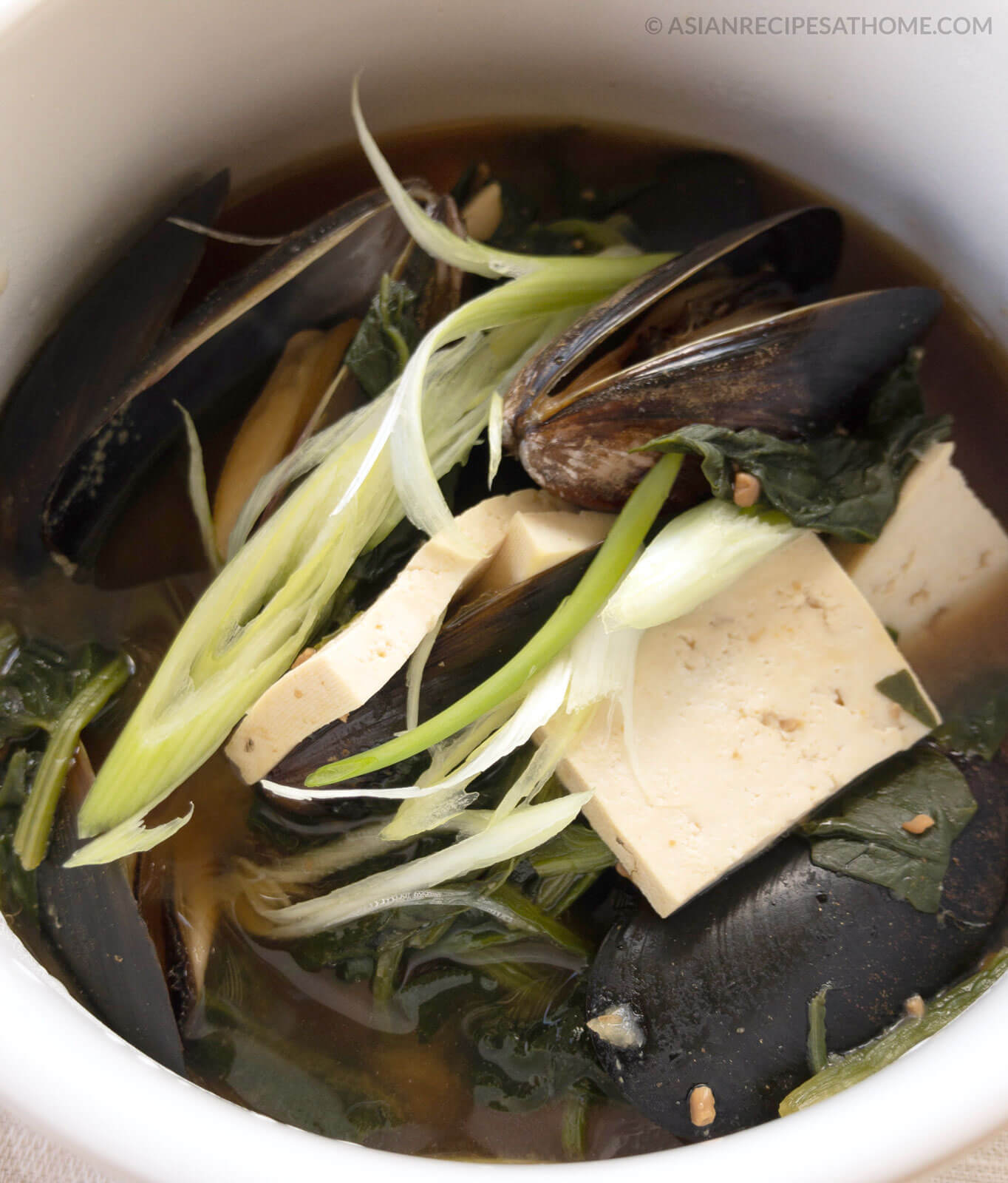 This Korean spinach and mussel fermented soybean (doenjang) soup is so easy to make and will make you feel good about eating it. 