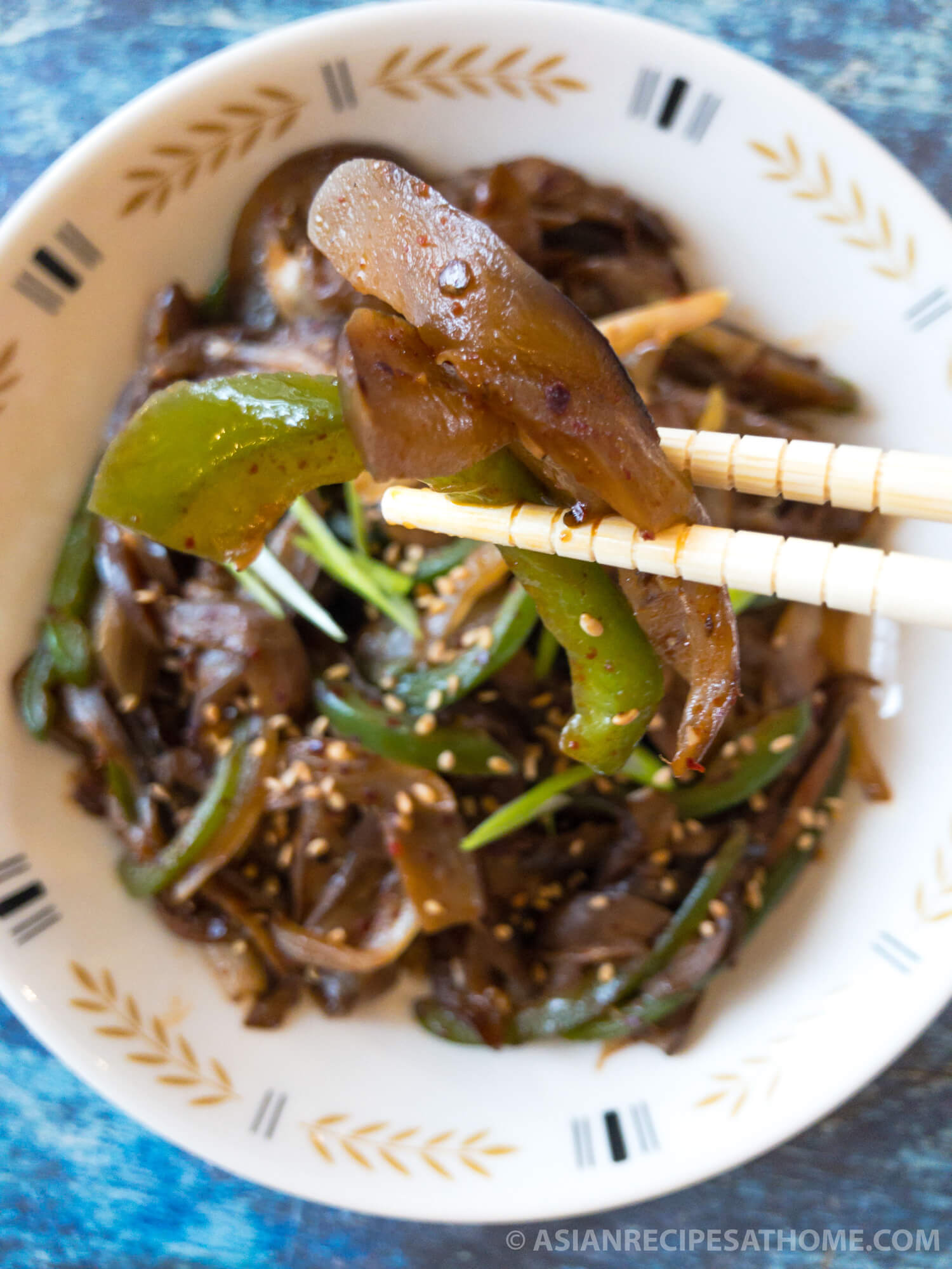 Make our Korean spicy stir-fried eggplant side dish recipe to go with your next meal. This side dish (banchan) is spicy, healthy, and a new spin on how you can prepare eggplants.