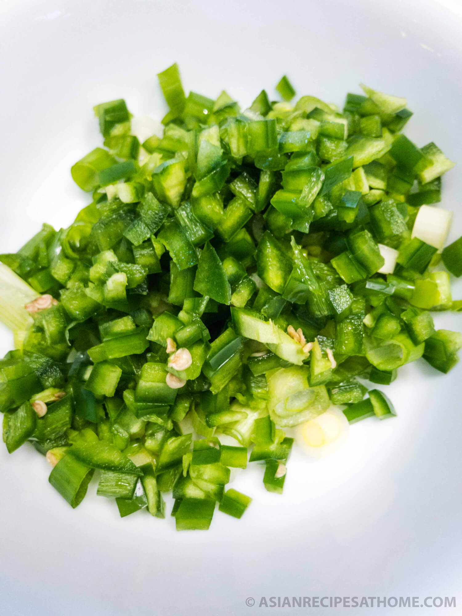 Fresh finely diced jalapenos prepped for the Asian-style Jalapeno and Green Onion Sauce.