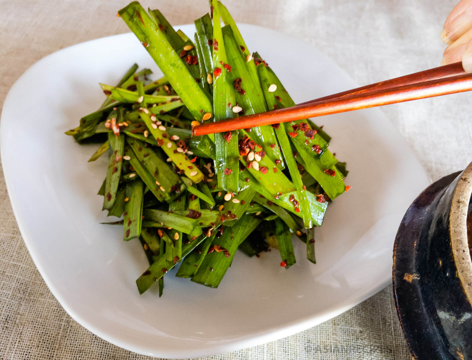This Korean garlic chives salad (buchu muchim) is spicy, healthy, & is incredibly easy to make.