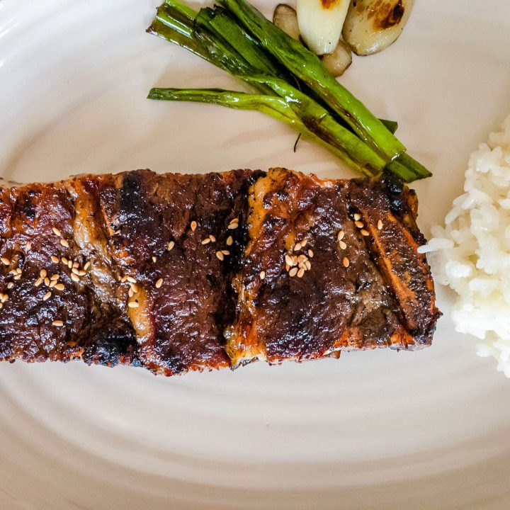 Make the best Korean BBQ short ribs (LA galbi gui) with our easy recipe. Korean-style beef short ribs are marinated in a delicious homemade marinade, and then grilled to perfection.