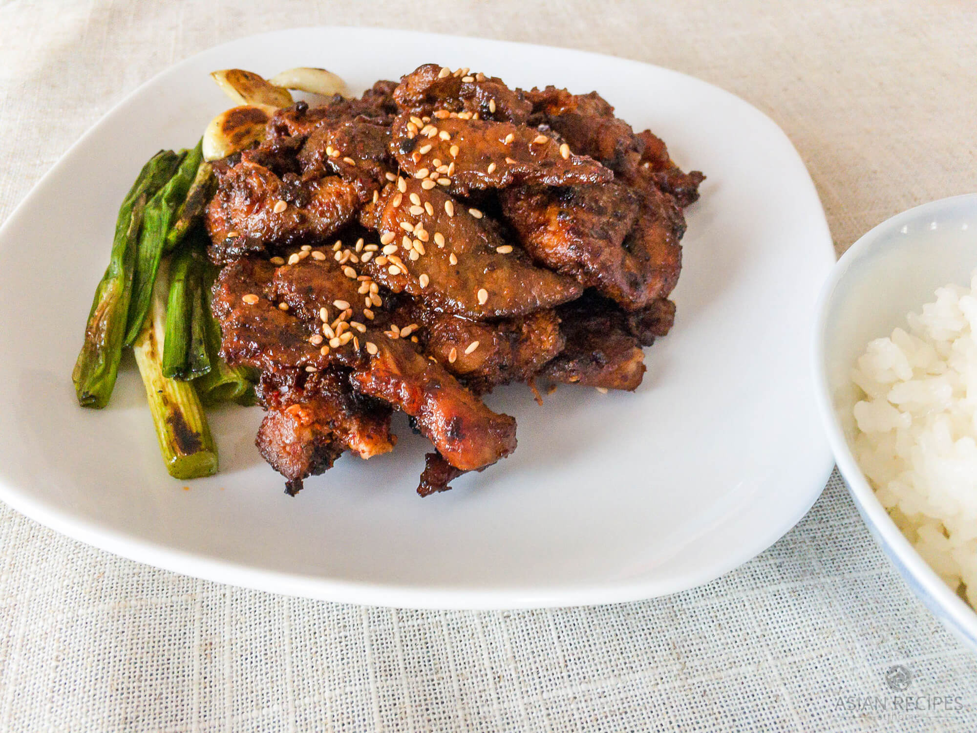 This spicy stir-fried pork belly recipe is so delicious and full of Korean flavors.