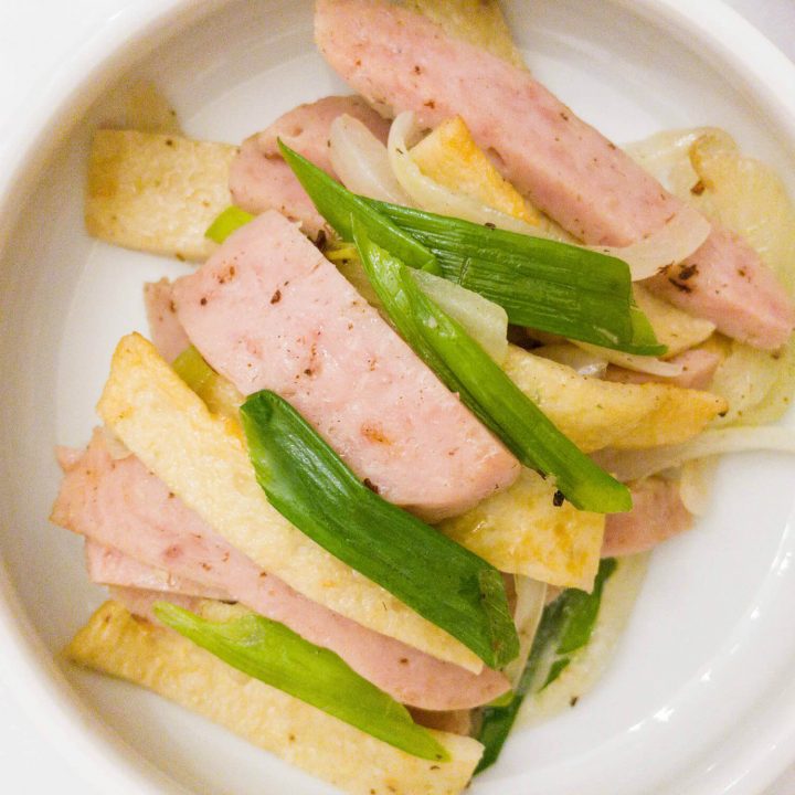This side dish recipe is made with Spam, Korean-style flat fish cakes and onions.