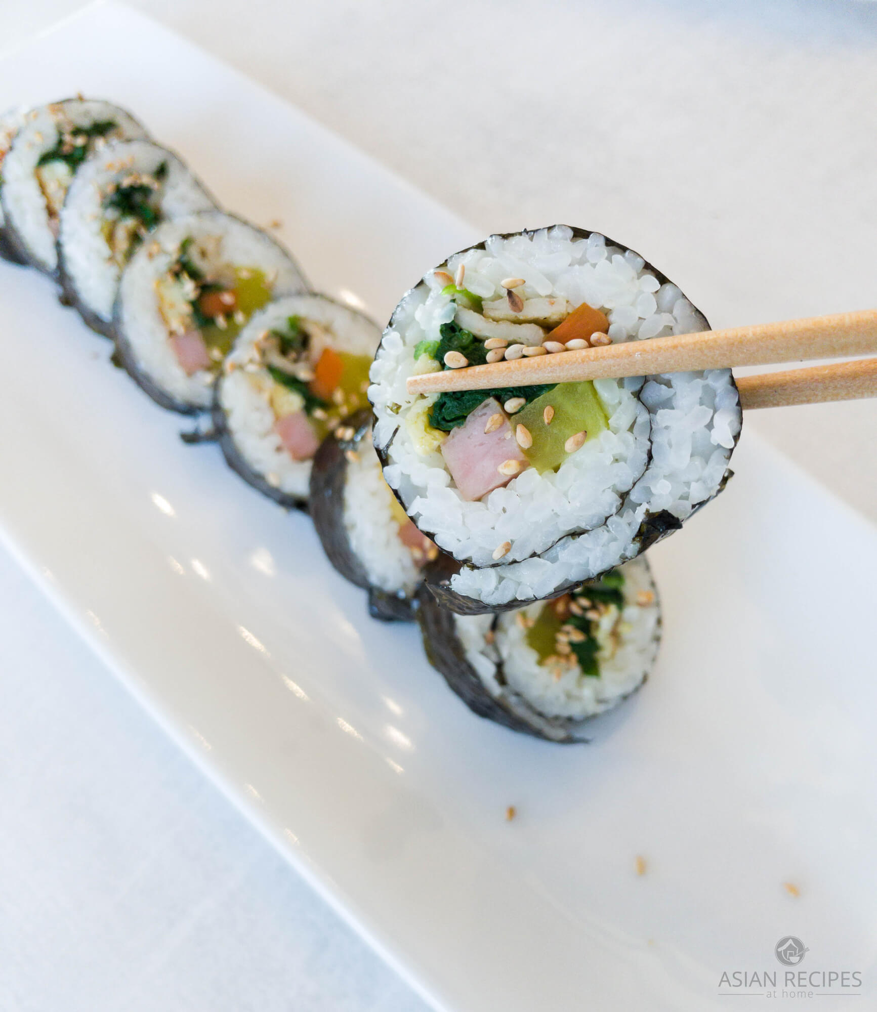 Make basic Korean kimbap, also known as Korean sushi rolls, with our easy and delicious recipe!