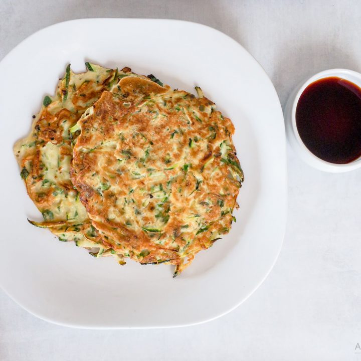Our savory pancakes are made with fresh zucchini and peppers. Easy to make and a healthy side dish or snack option!
